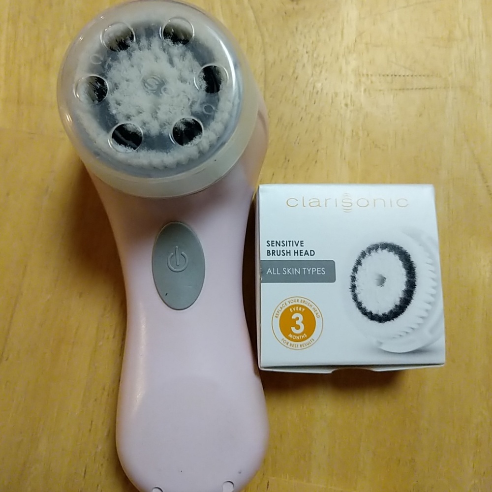 Clarisonic facial brush with brand new brush head